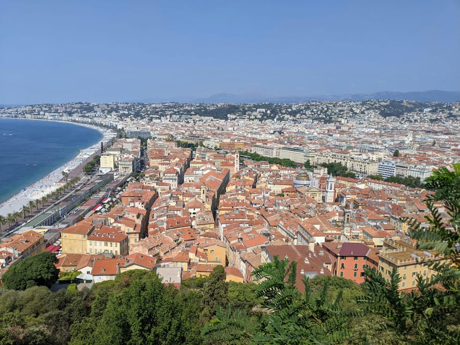 Aerial view of the Nice cityscape: coastline and urban grid on the French Riviera.